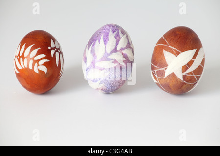 Three hand painted Easter eggs from Slovakia, isolated on white background. Stock Photo