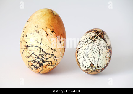 Two hand painted Easter eggs from Slovakia, isolated on white background. Stock Photo
