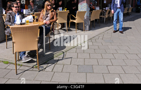 Amsterdam, Netherlands. Young couple at café table Stock Photo