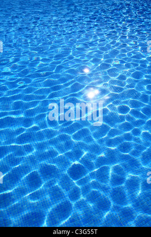 blue tiles swimming pool water reflection texture image Stock Photo