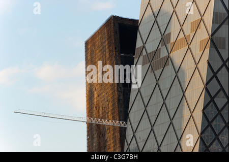 The burnt and the rebuilt CCTV TV station HQ by OMA Rem Koolhaas architecture studio, 2009, CBD, Beijing, China, Asia. Stock Photo