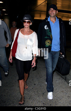 Jaime Pressly and her new husband Simran Singh arrive at LAX airport ...