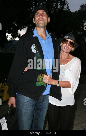 Jaime Pressly and her new husband Simran Singh arrive at LAX airport on