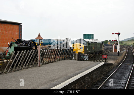 Diesel locomotives and a crane at Weybourne Station on the North Norfolk Railway, Norfolk, England. Stock Photo