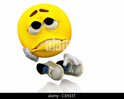 Smiley, emoticon. Facial expression. Sad emotional expression on a yellow face with large eyes with shoes. Stock Photo