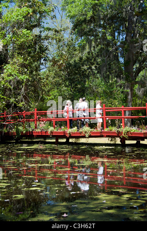 South Carolina, Charleston, Magnolia Plantation & Gardens. Red garden bridge. Stock Photo
