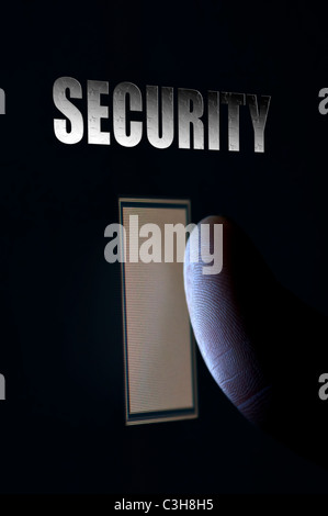 Concept for modern security with closeup fingerprint scanning technology Stock Photo