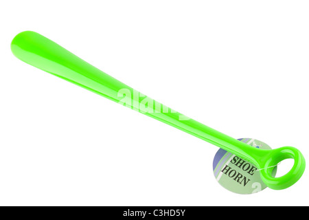 Long green plastic shoe horn with label Stock Photo