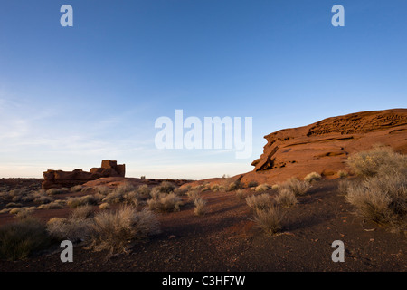 Three story Wukoki Pueblo sits on an isolated block of red sandstone at Wupatki National Monument, Arizona, USA. Stock Photo