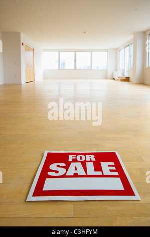 For sale sign in empty room Stock Photo