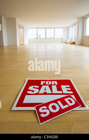 For sale sign in empty room Stock Photo