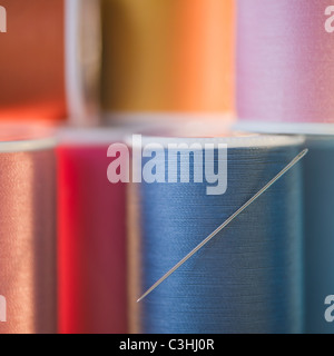 Spools with colorful threads Stock Photo