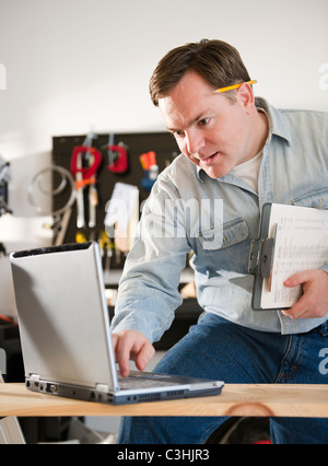 Man using laptop Stock Photo