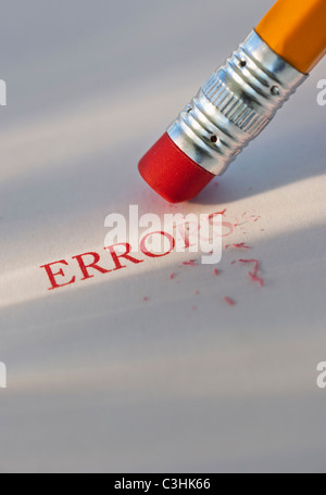 Studio shot of pencil erasing the word errors from piece of paper Stock Photo