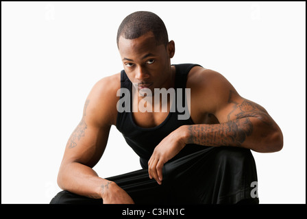 Studio shot of young man in sports clothing Stock Photo