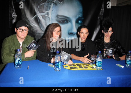 Georg Listing, Gustav Schafer, Bill Kaulitz and Tom Kaulitz Tokio Hotel sign copies of their new CD 'Humanoid' at Best Buy New Stock Photo