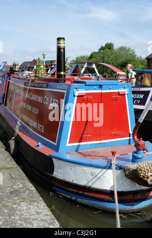 Brightly painted canal narrow boats moored at the National Waterways Museum at Ellesmere Port in Cheshire Stock Photo