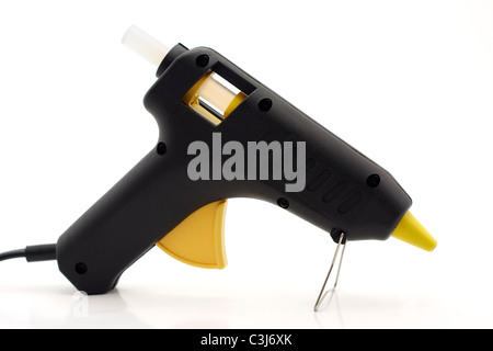 Hot glue pistol on white background Stock Photo