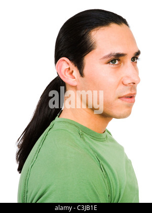 Young man thinking and posing isolated over white Stock Photo