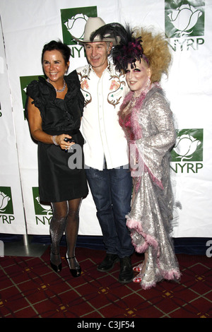 Bette Midler poses with John McEnroe and Patti Smith Bette Midler's New York Restoration Project Benefit Gala 'Hulaween' held Stock Photo