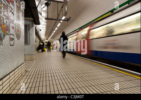 Subway train set in motion Stock Photo