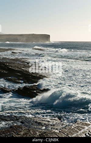 dh Bay of Skaill SANDWICK ORKNEY West rocky coast of Orkney surf waves coming ashore seascape