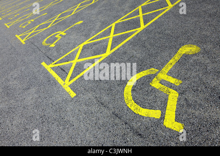 Disabled badge holders only sign for disabled drivers in a car park in the uk. Stock Photo