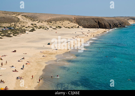 dh Playa Mujeres beach PAPAGAYO LANZAROTE People at seaside canary islands idyllic island tourist destination Stock Photo