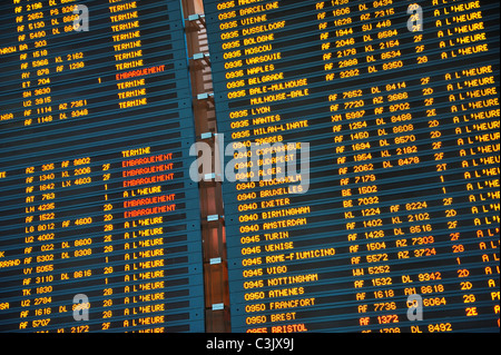 Arrival / departure board at Paris Charles de Gaulle International Airport, France Stock Photo