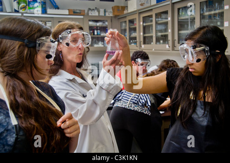 High school chemistry students and teacher in San Clemente, CA, perform an experiment using titration. Stock Photo