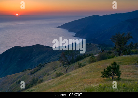 Sunset over the Pacific Ocean from the hills of the Ventana Wilderness, Los Padres National Forest, Big Sur coast, California Stock Photo