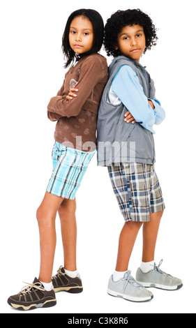 Two girls standing together isolated over white Stock Photo