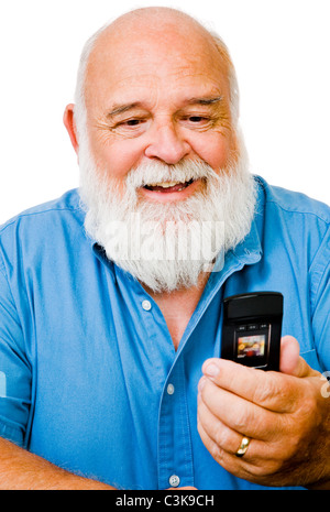 Confident man text messaging on a mobile phone isolated over white Stock Photo