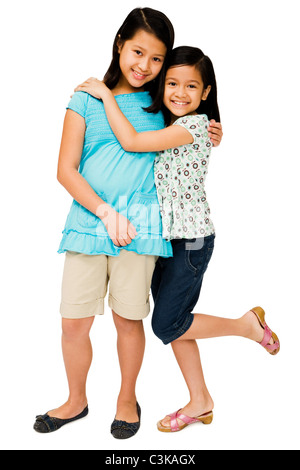 Close-up of two girls hugging each other Stock Photo - Alamy