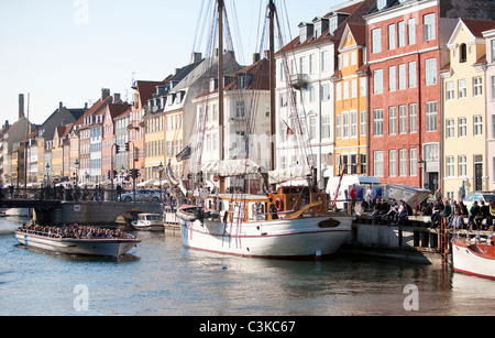 Waterfront with boats and cafes Stock Photo