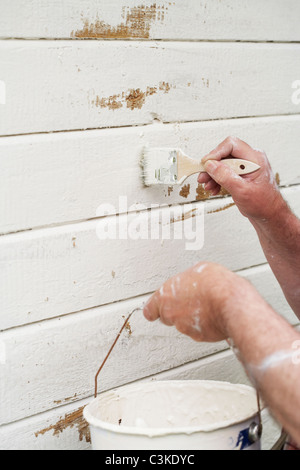 A man renovating a house, Sweden. Stock Photo