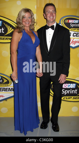 Kurt Busch, Eva Busch pose on the red carpet for the NASCAR Sprint Cup Series awards banquet during the final day of the NASCAR Stock Photo