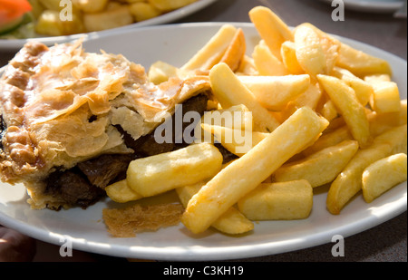 Pie and Chips in a Fish and Chip Shop Stock Photo