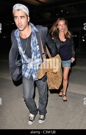 Colin Farrell and girlfriend Alicja Bachleda arrive at LAX airport after vacationing in Cabo Los Angeles, California - 01.12.09 Stock Photo