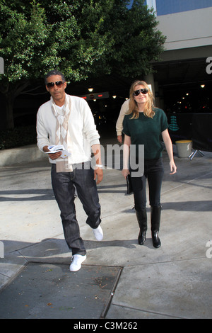 Ellen Pompeo And Chris Ivery arriving at the Staples Center to watch an LA Lakers game. Los Angeles, California - 25.12.09 Stock Photo