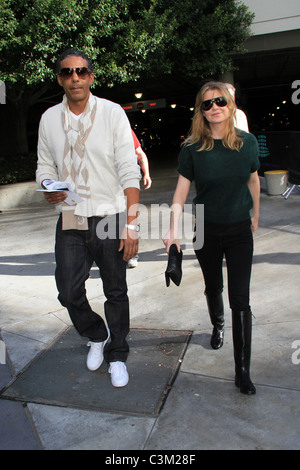 Ellen Pompeo And Chris Ivery arriving at the Staples Center to watch an LA Lakers game. Los Angeles, California - 25.12.09 Stock Photo