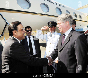 Pakistan President, Asif Ali Zardari being received by Russia Deputy Foreign Minister, Alexei Borodavkin upon his arrival Stock Photo