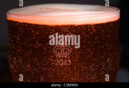 UK PINT BEER GLASS WITH CROWN STAMP Stock Photo