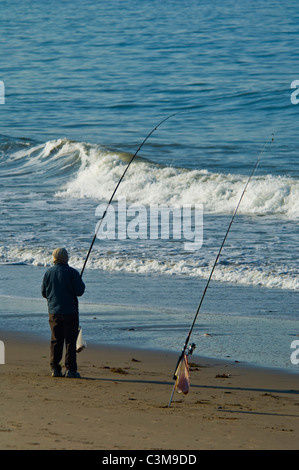 Surf fisherman fishing at El Capitan State Beach, near Santa Barbara, California Stock Photo