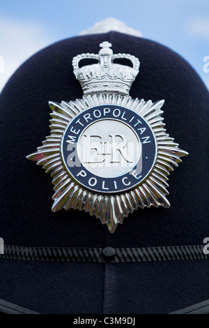 London Metropolitan / Met police / policeman's helmet / hat with cap badge. Stock Photo