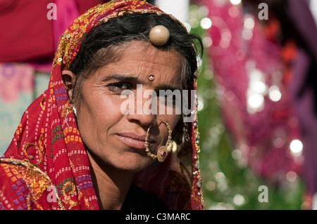 Indian woman wearing her sari for a wedding. Stock Photo