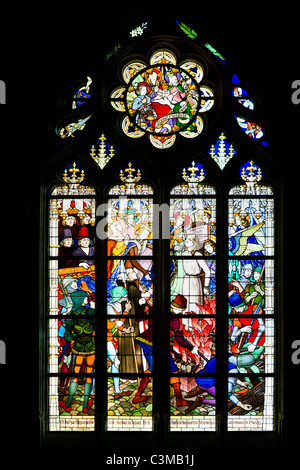 Stained glass window showing the burning of Joan of Arc, Orleans Cathedral (Cathedrale Sainte Croix d'Orleans), Orleans, France Stock Photo