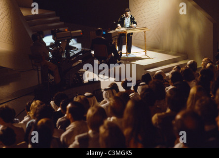 Dubai UAE Man Playing Xylophone On Stage With Audience Watching Stock Photo