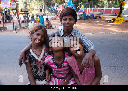 Asian children pulling faces at the camera. Stock Photo