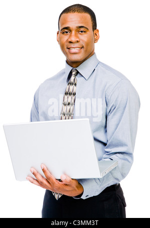 African American businessman using a laptop and posing isolated over white Stock Photo